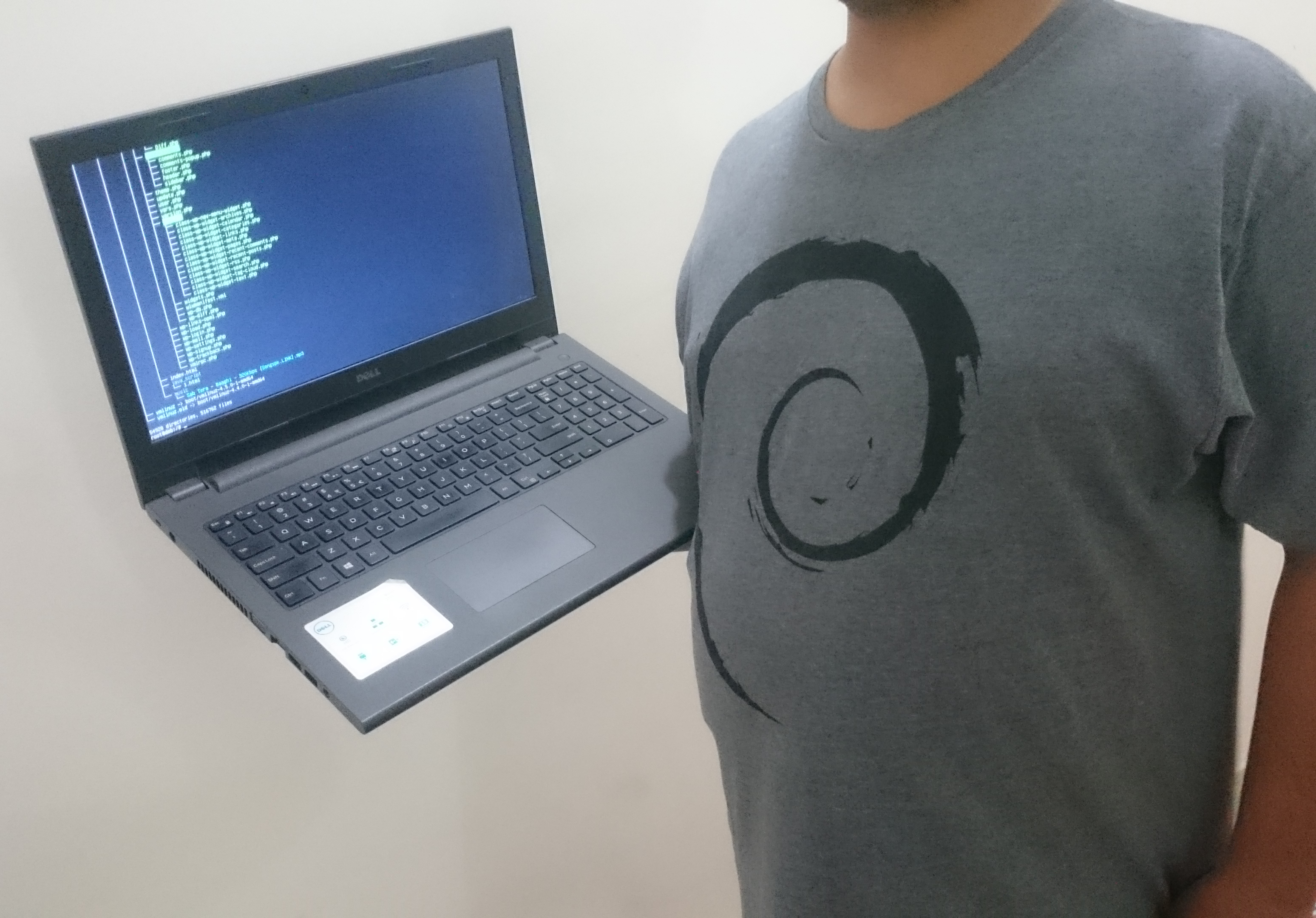 In Meeting - Taking to SYS Admins. The Debian Logo on my T-Shirt makes me Perfect.